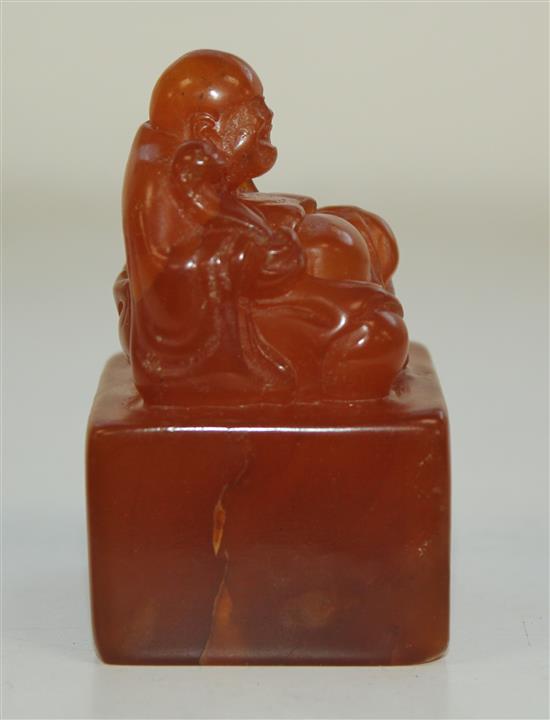 A Chinese Tianhuang stone Budai seal, 173g., 6.5 x 4 x 4cm